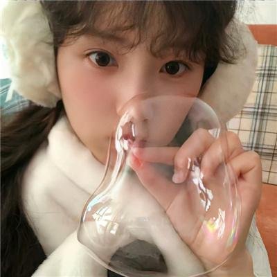 桃花含露又春风